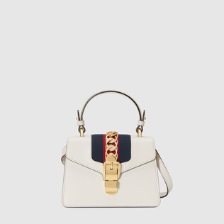 white gucci sling bag