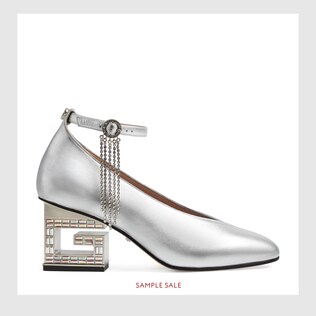 Mid-heel pump with crystal G heel