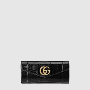 Broadway snakeskin clutch with Double G