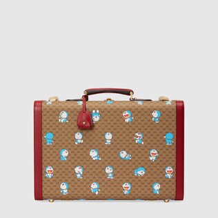 pink gucci suitcase