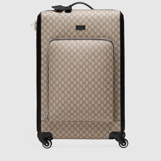 black gucci luggage