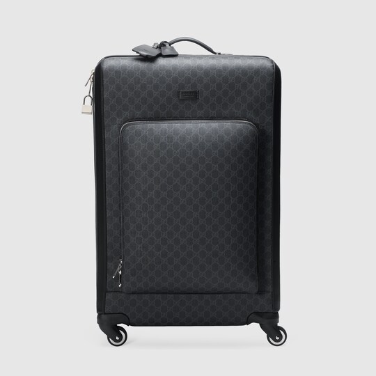 black gucci luggage