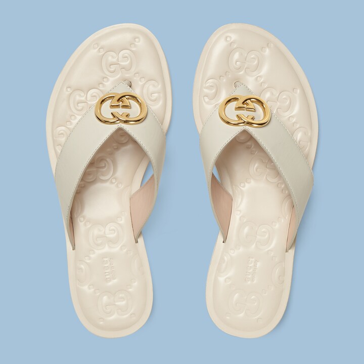 Women's Interlocking G thong sandal in white leather GUCCI® NZ
