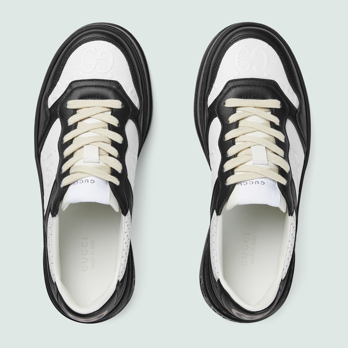 Women's GG embossed sneaker in white and black leather GUCCI® US