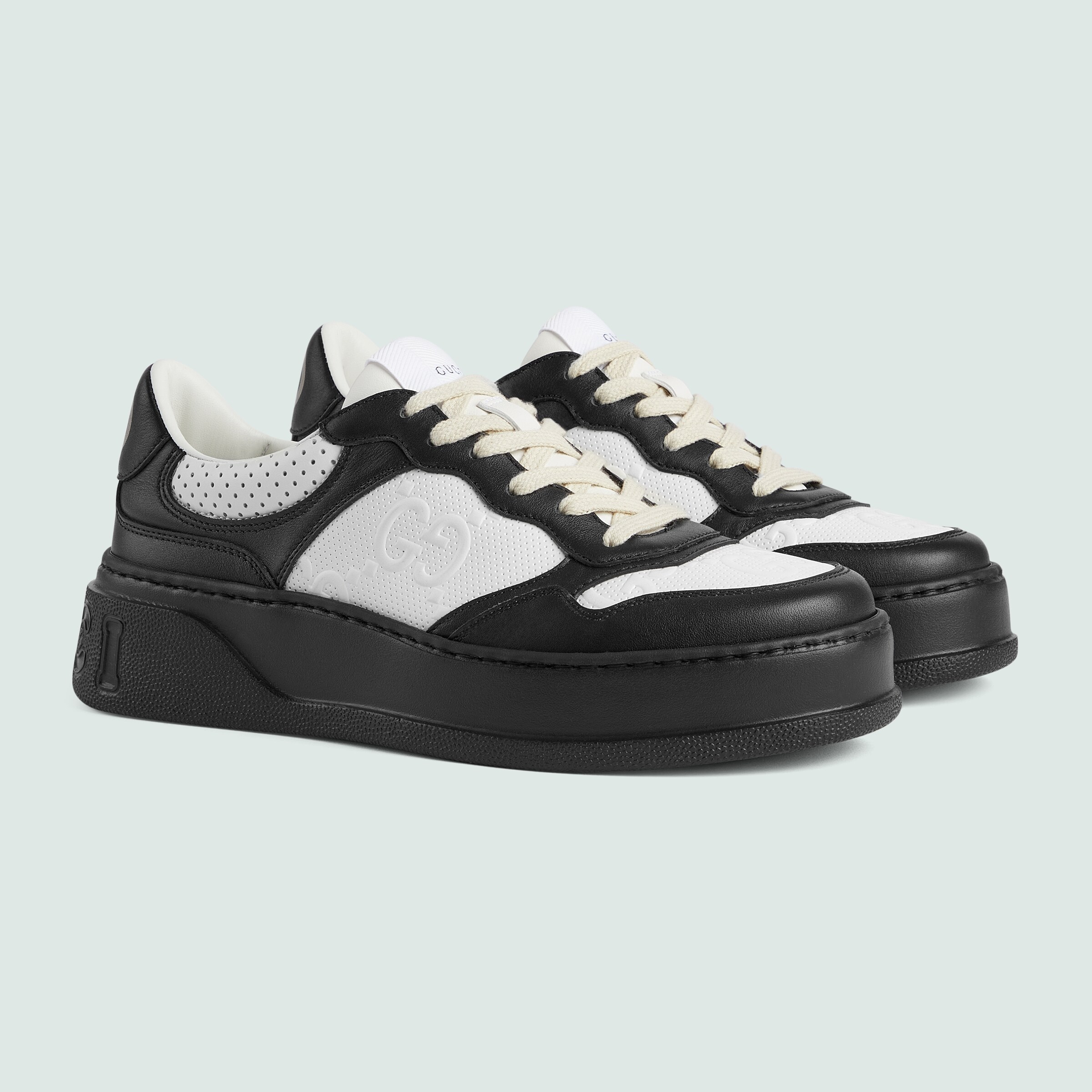 Women's GG embossed sneaker in white and black leather GUCCI® US