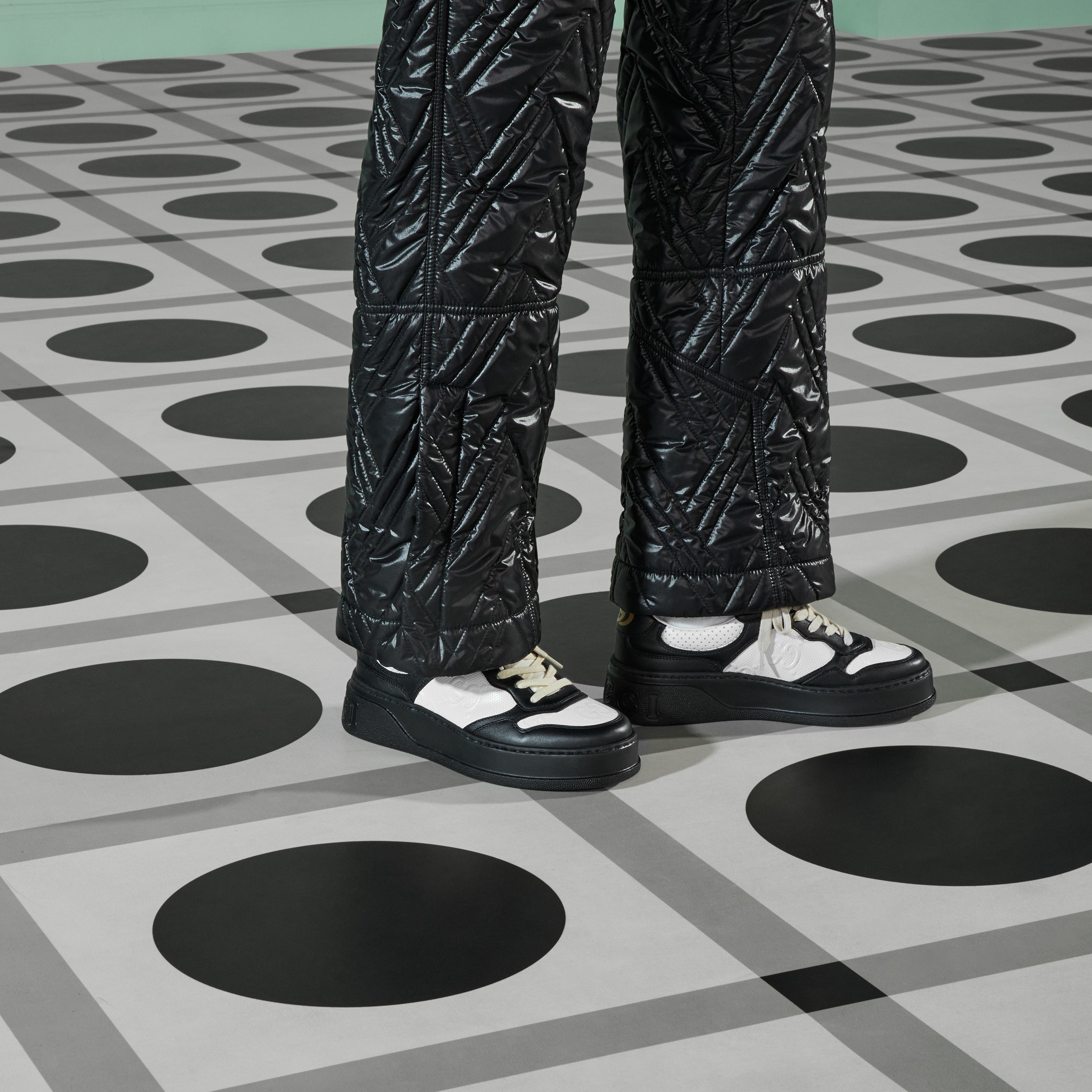 Women's GG embossed sneaker in white and black leather GUCCI® US