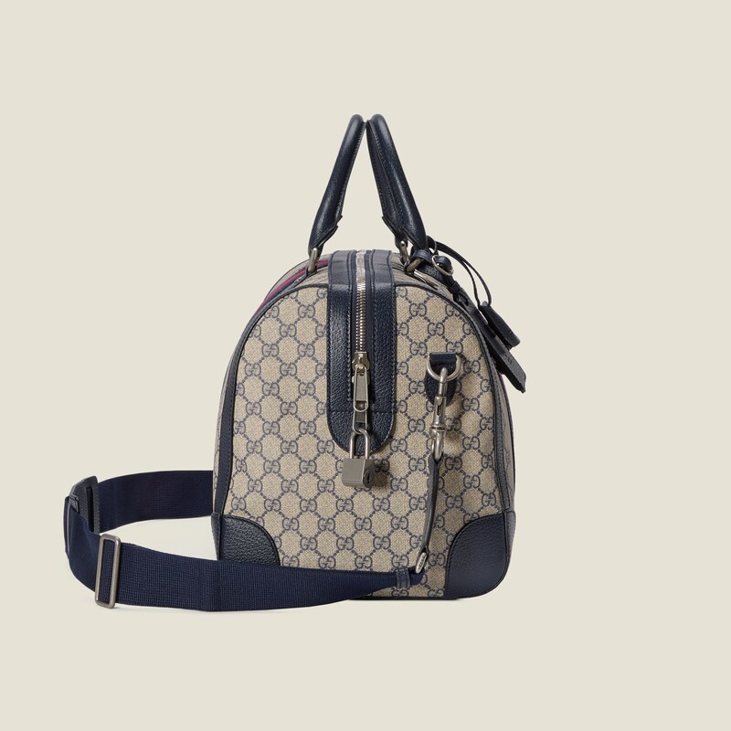 Ophidia medium duffle bag in beige and 
