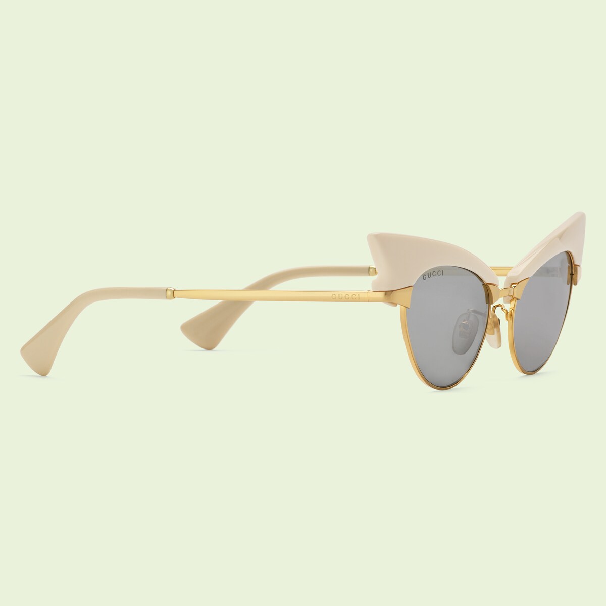 Cateye sunglasses with interchangeable frame in yellow goldtoned