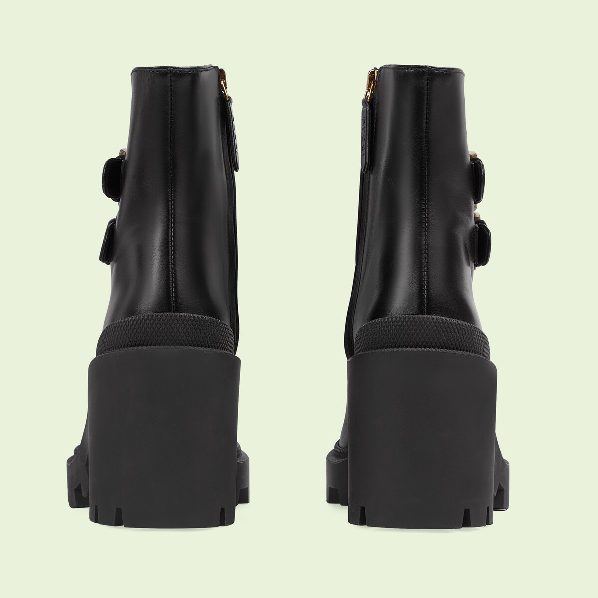 Women's GG ankle boot with buckles in black leather GUCCI® AE