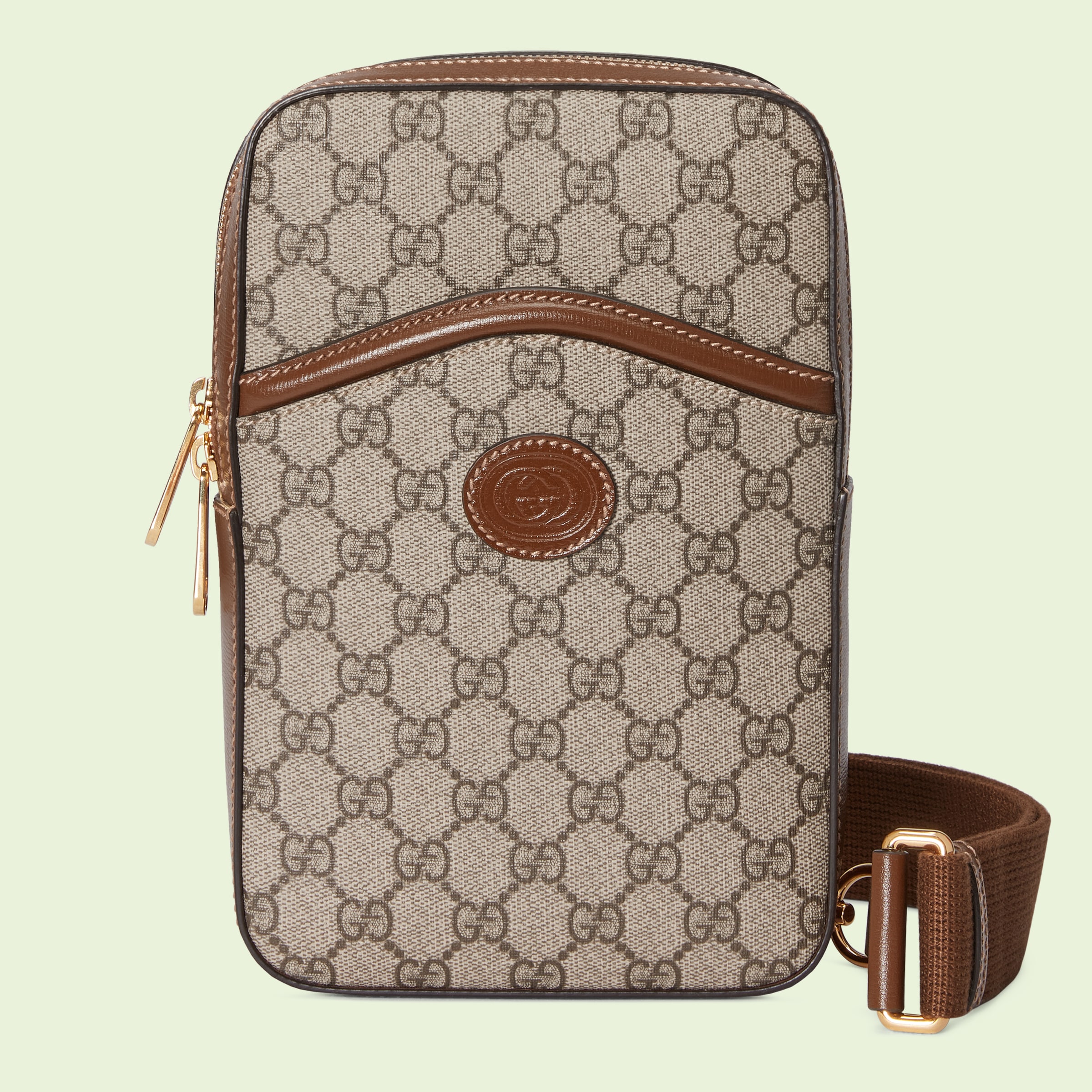 Sling backpack with Interlocking G in beige and ebony Supreme GUCCI® US