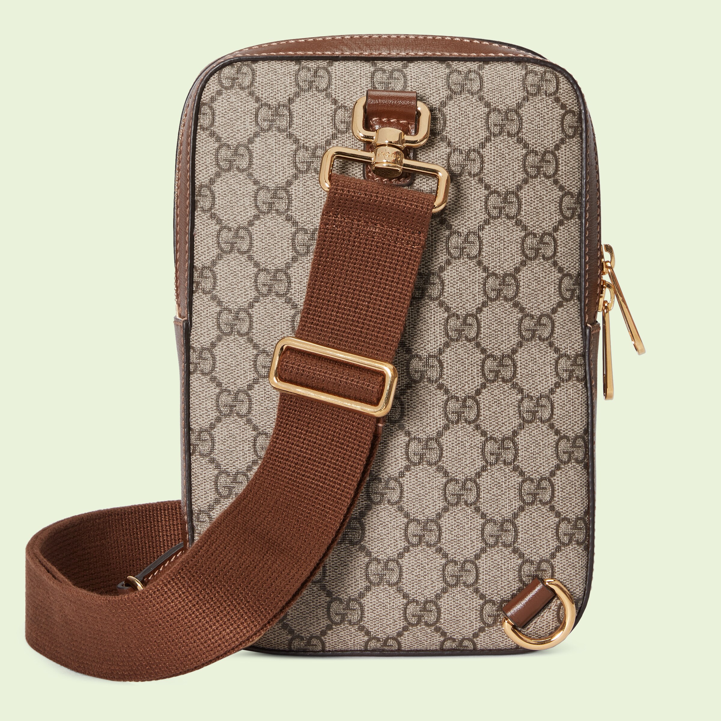 Sling backpack with Interlocking G in beige and ebony Supreme GUCCI® US