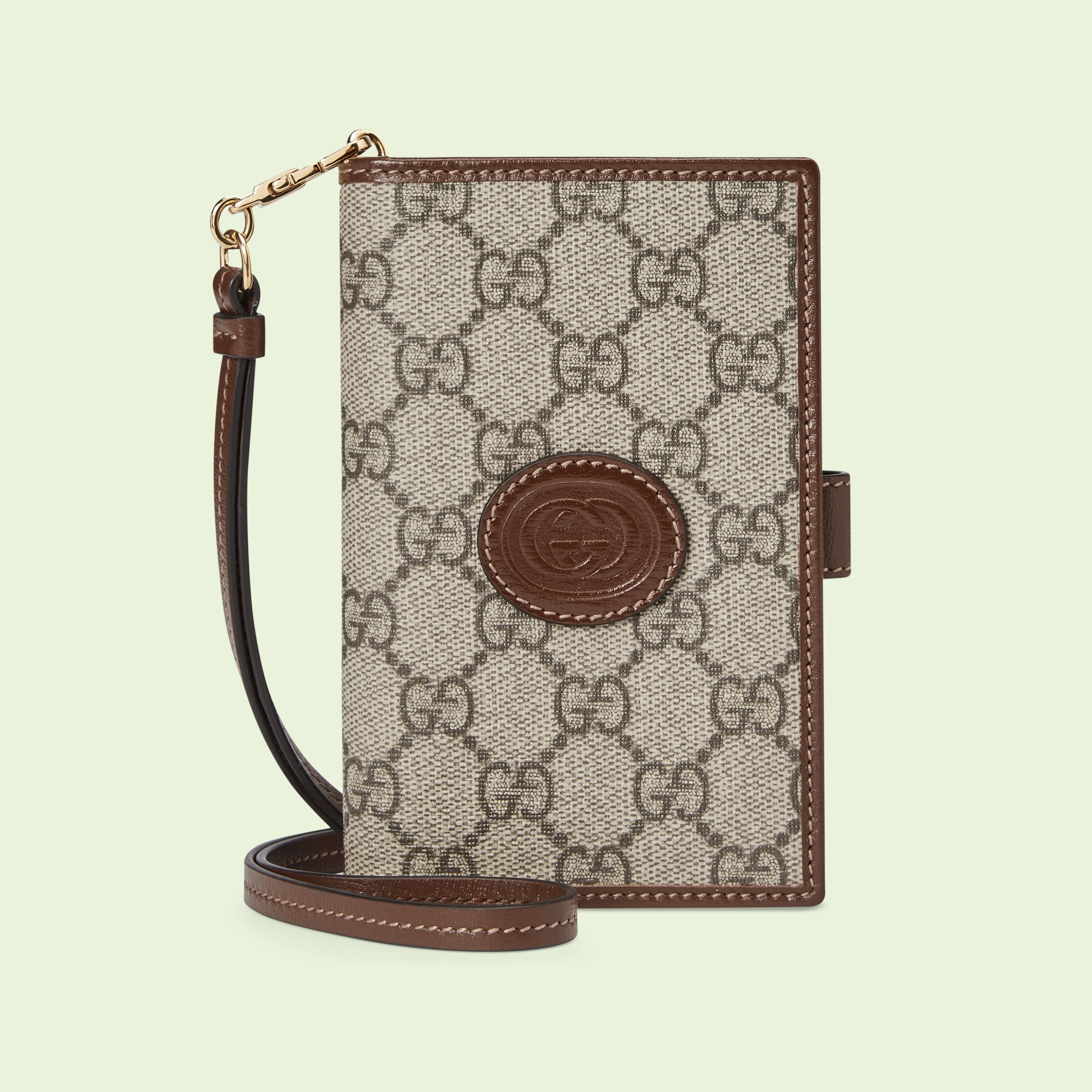 Passport case with Interlocking G tag in beige and ebony GG Supreme