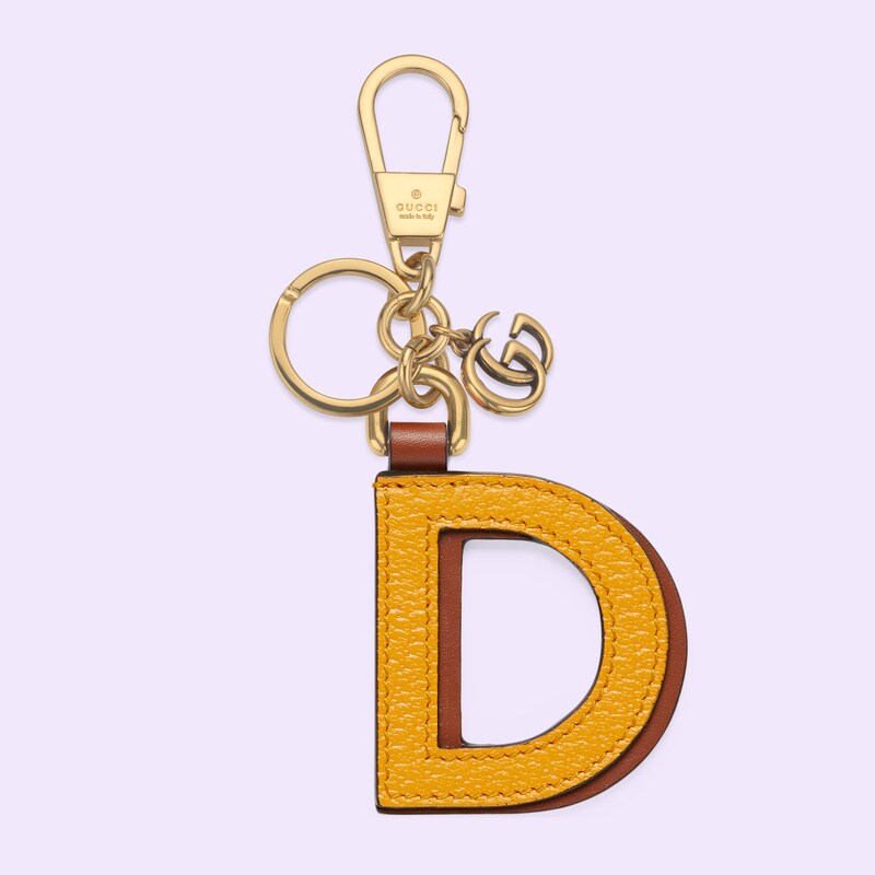 Portachiavi lettera D in pelle gialla e marrone | GUCCI® Italia