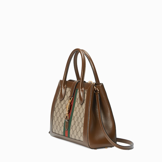 Medium tote bag with piston closure