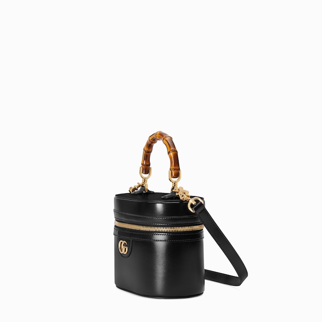 Mini vanity bag with bamboo handle
