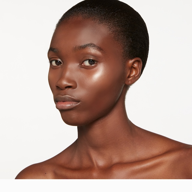 03, Gucci Glow Highlighter powder