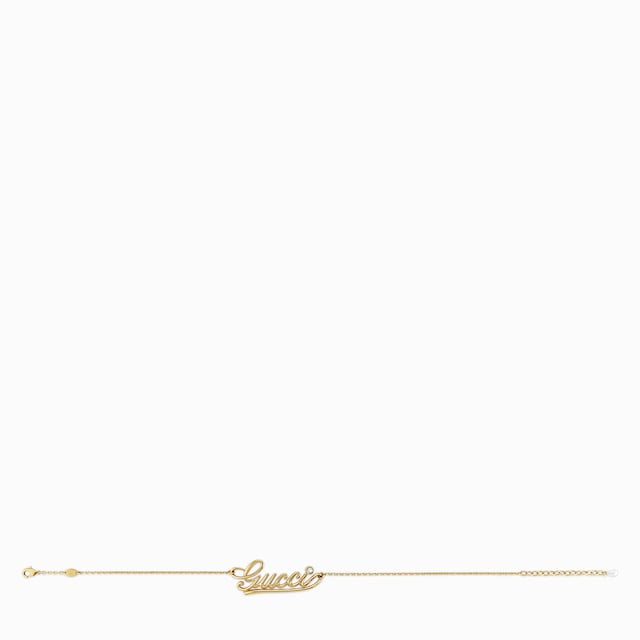 Колье-чокер с надписью «Gucci»