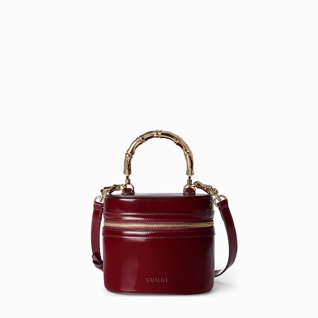 Mini vanity bag with bamboo handle