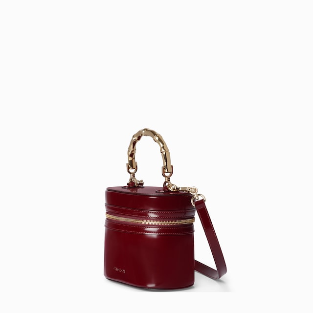 Mini vanity bag with bamboo handle