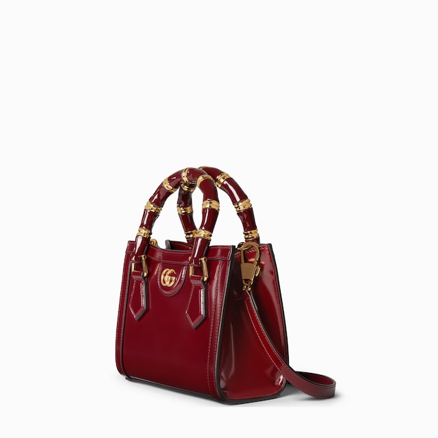 حقيبة اليد الكبيرة صغيرة الحجم بتقليم من جلد النعامة Gucci Diana