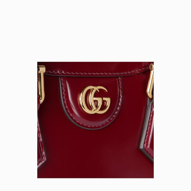 حقيبة اليد الكبيرة صغيرة الحجم بتقليم من جلد النعامة Gucci Diana