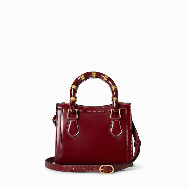 حقيبة اليد الكبيرة صغيرة الحجم بتقليم من جلد النعامة Gucci Diana