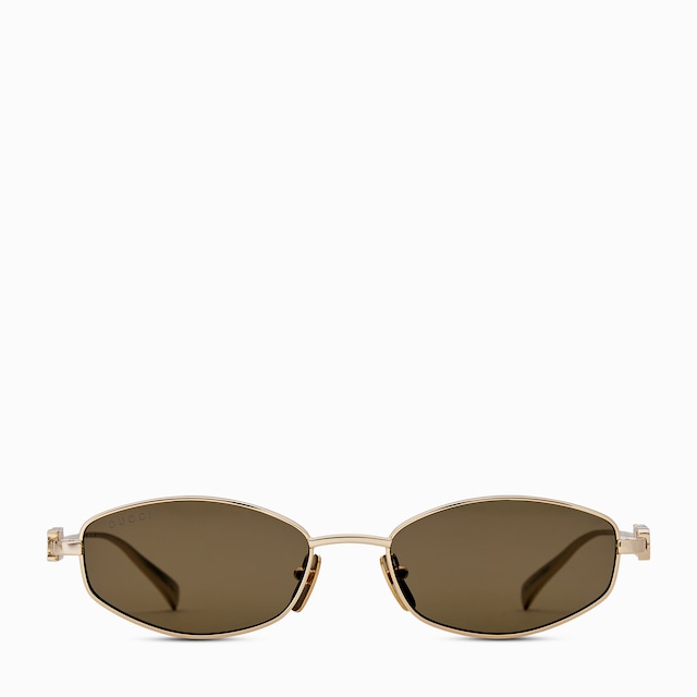 Oval frame sunglasses in gold-toned | GUCCI® US