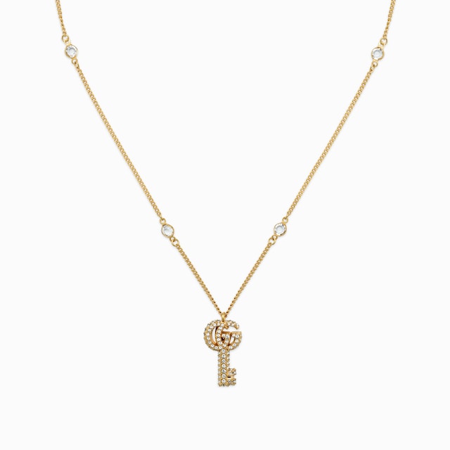 Double G necklace with crystals in antique gold-toned metal