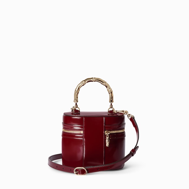 Mini vanity bag with bamboo handle