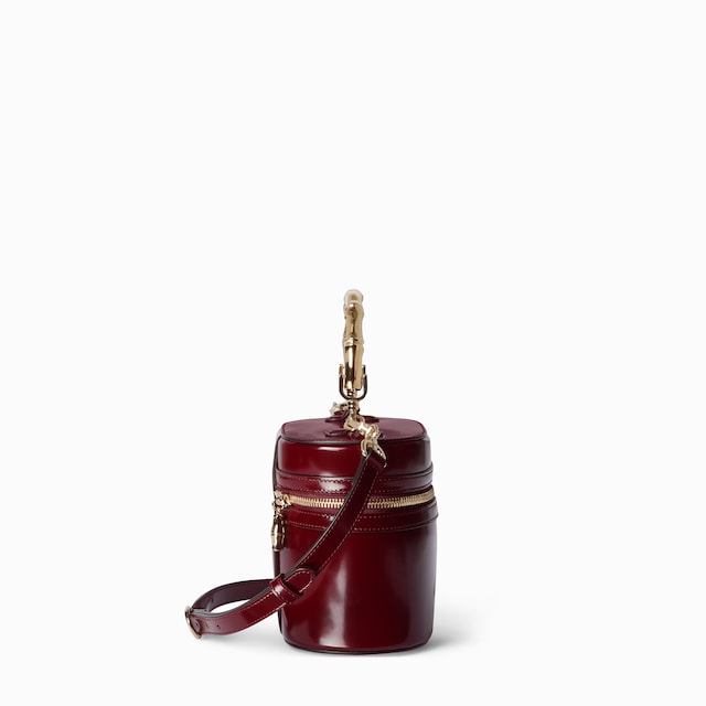 Mini vanity bag with bamboo handle