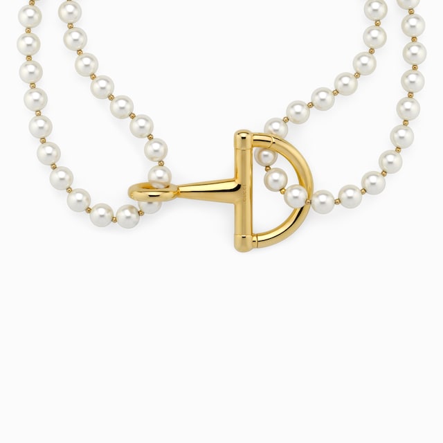 Necklace with stirrup