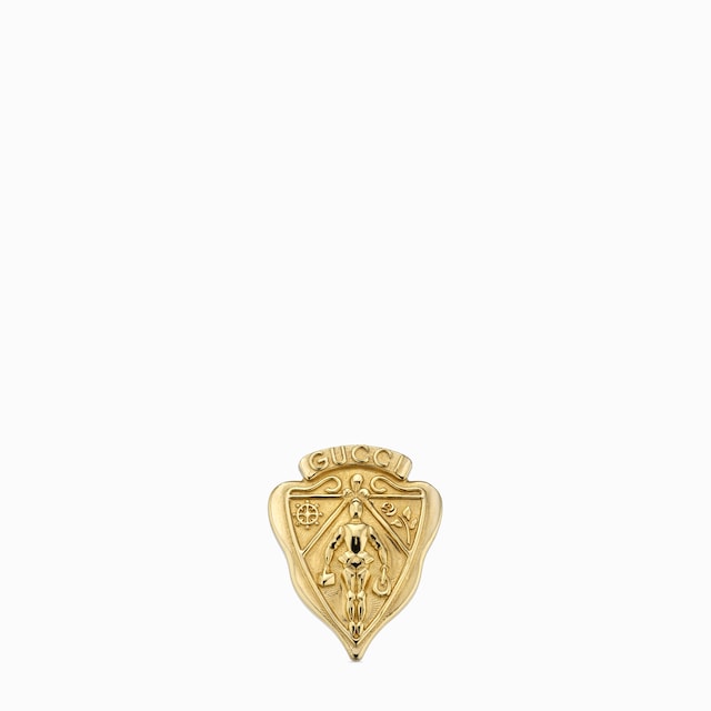 Broche con insignia de Gucci