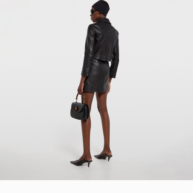 Leather with aged effect jacket - image 4