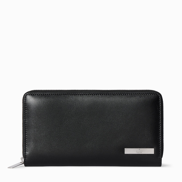 Zip around wallet with metal tag