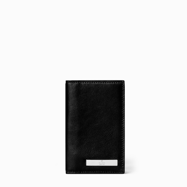 Card case with metal tag