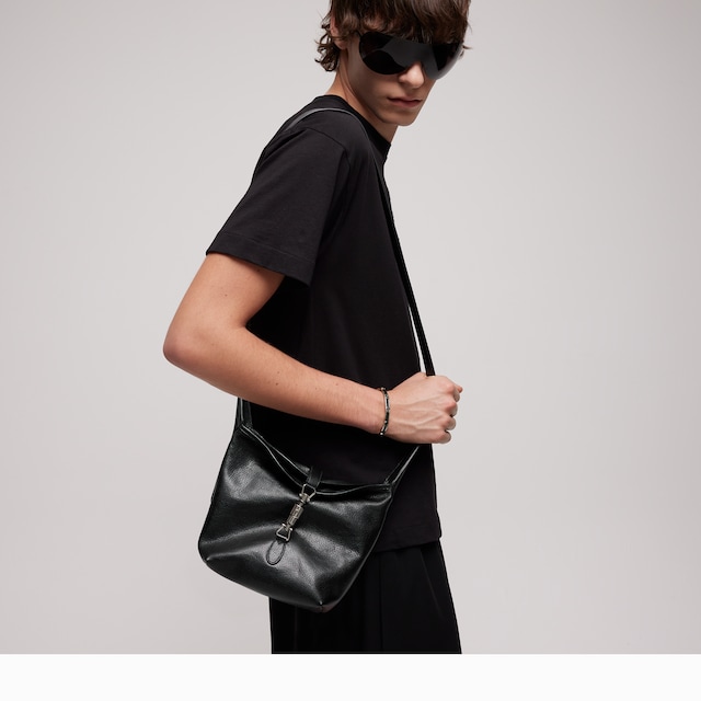 Mini bag with piston closure