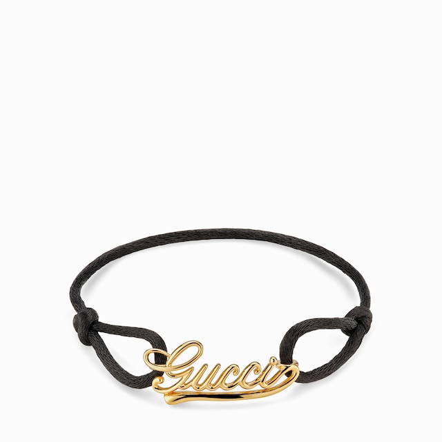 Bracelet cordon à inscription Gucci