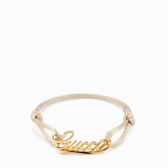 Bracelet cordon à inscription Gucci