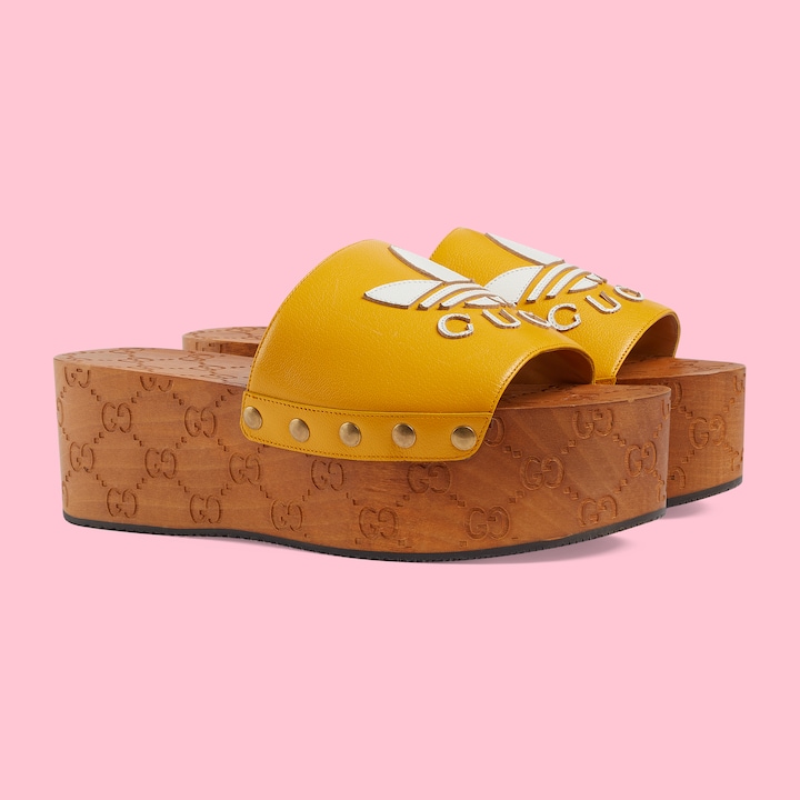 adidas x Gucci Women's GG clog in dark yellow leather GUCCI® IE