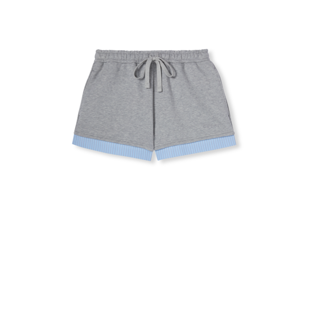 Low waist GG denim jacquard shorts in blue | GUCCI® US