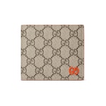 beige and dark brown Supreme