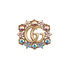 Broche con flores de cristal y Doble G