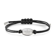 Trademark cord bracelet with tag