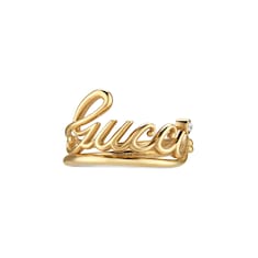 Anello largo con scritta Gucci