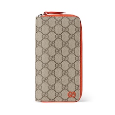 Orange interior zip around wallet