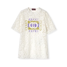 بلوزة من الدانتيل المُزهر مزيّن بشعار Gucci