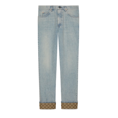 Washed denim trouser with GG turn ups in light blue | GUCCI