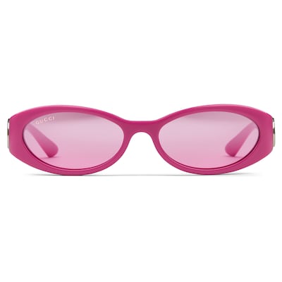 Sonnenbrille mit ovalem Rahmen in fuchsia | GUCCI® DE