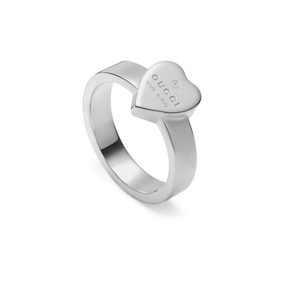 Trademark ring with heart pendant