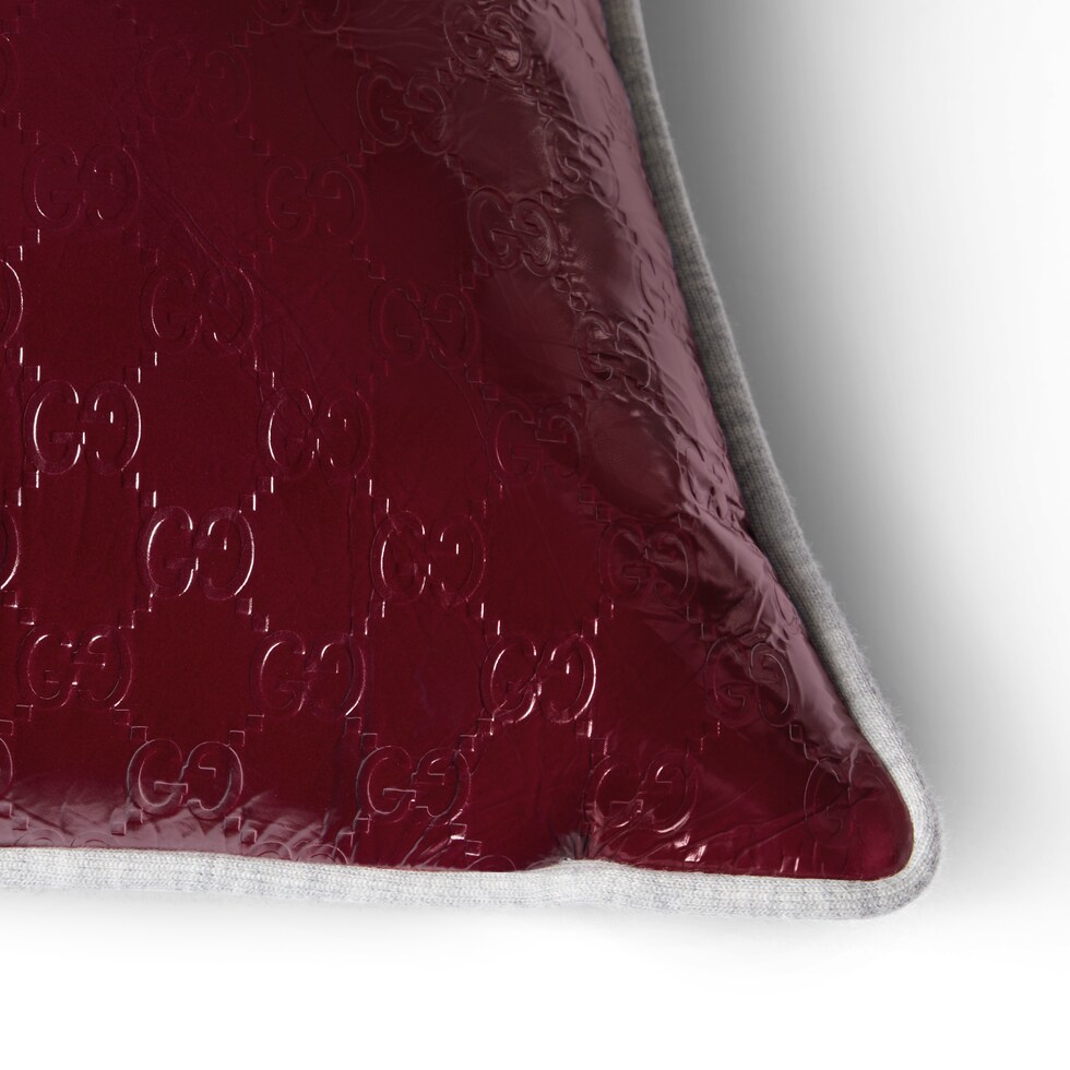 Embossed jersey and leather cushion